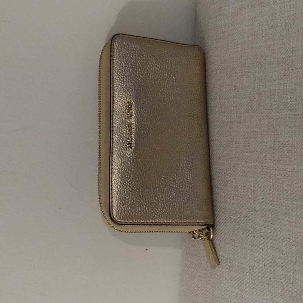 Michael Kors Gold zipper wallet